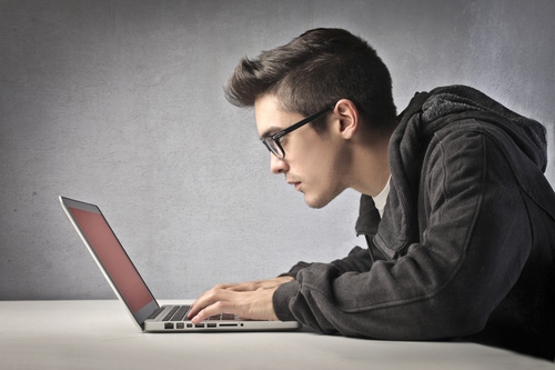 teen on computer